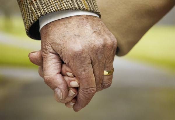 Photograph Chris Frazer Smith Holding Hands on One Eyeland